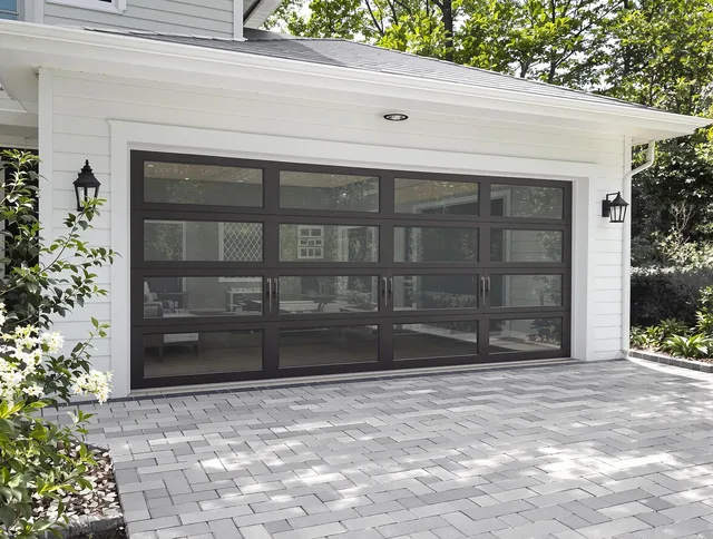 Pembroke Pines Garage Door Repair design specialist presenting custom garage door options to Pembroke Pines homeowner