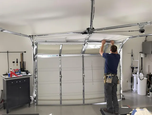 Pembroke Pines Garage Door Repair specialist performing precise section replacement on Pembroke Pines garage door